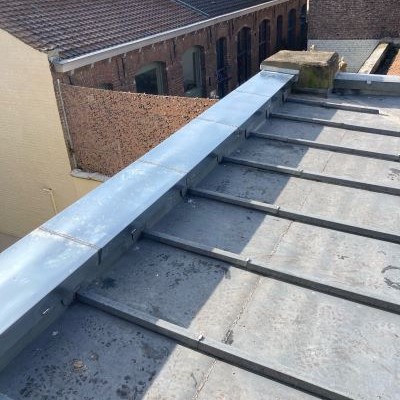 Réparation gouttière zinc inter cheminée toiture Lille hauts de France