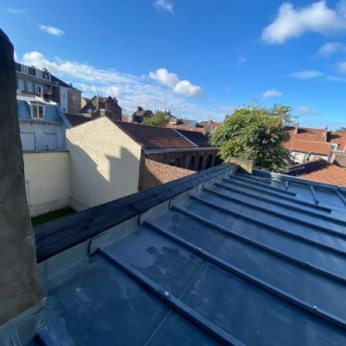 Réparation gouttière zinc inter cheminée toiture Lille hauts de France