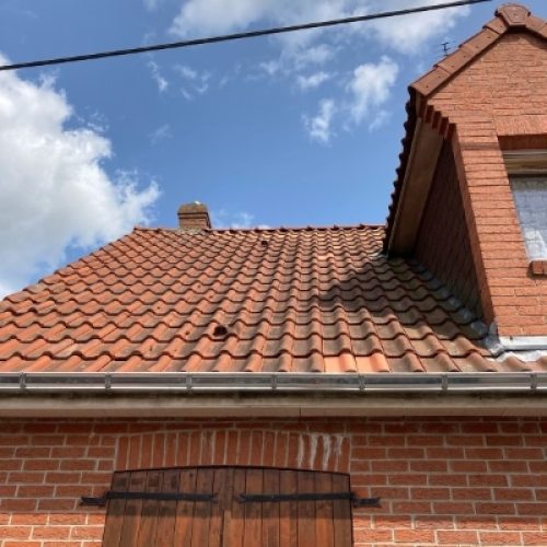 Réparation gouttière zinc inter cheminée toiture Lille hauts de France