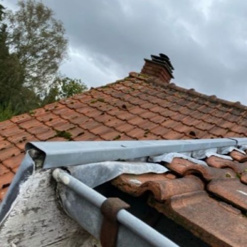 réparation rive tuile et zinc inter cheminée toiture haut de France - Lille