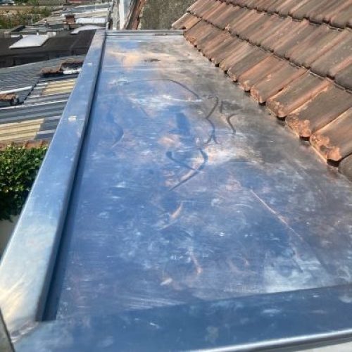 dessus de lucarne zinc inter cheminee toiture nord